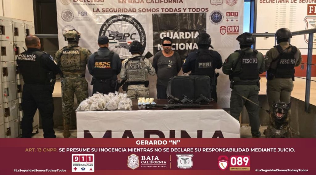 Detienen a sujeto con maleta con droga y arma de grueso calibre