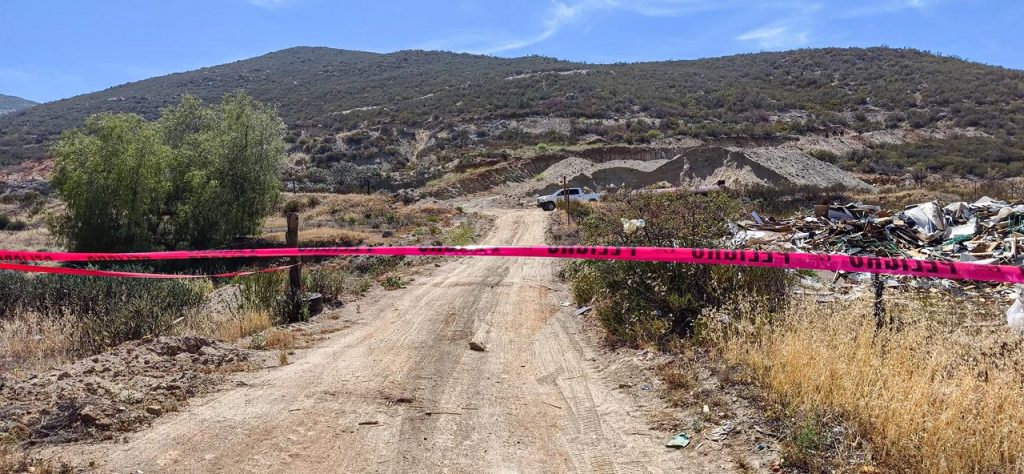 Hallan cuerpo calcinado de un menor dentro de una maleta en Tecate